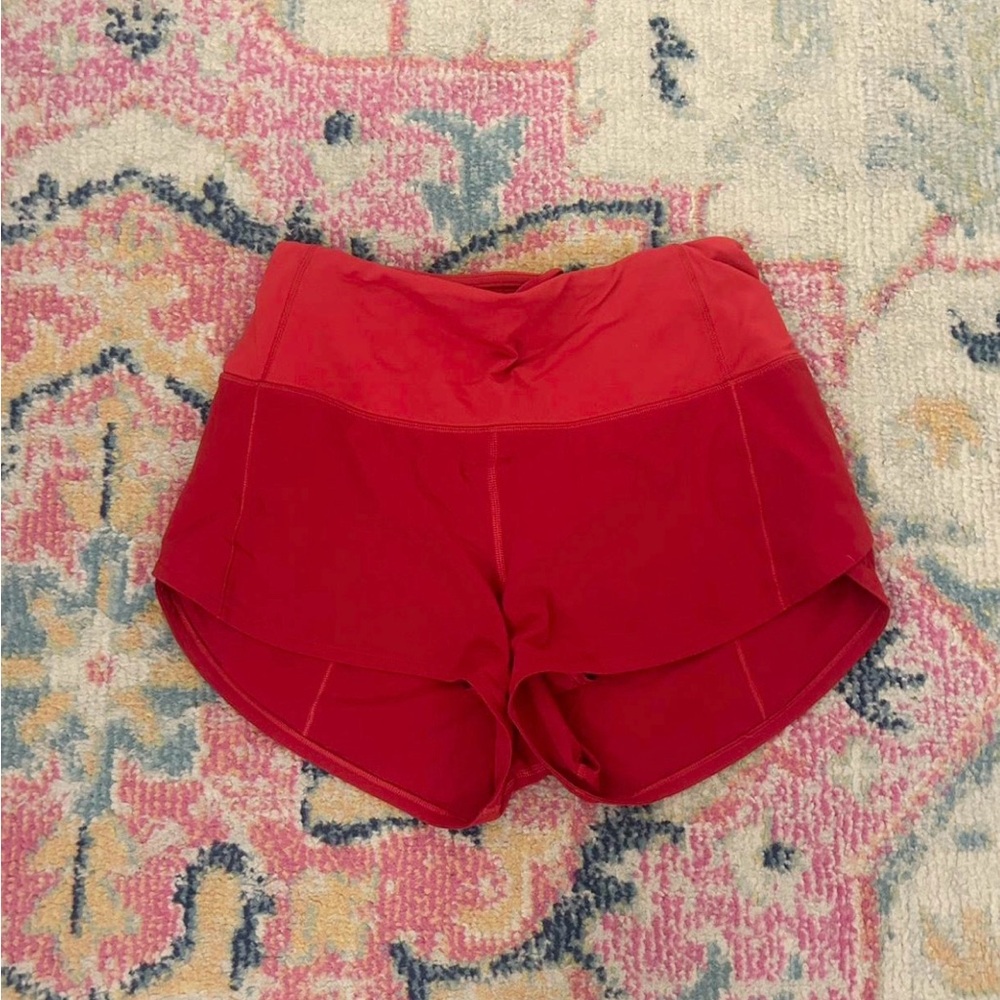 Lululemon Athletica Bold Red Athletic Shorts (size 4 high rise 2.5 inch)